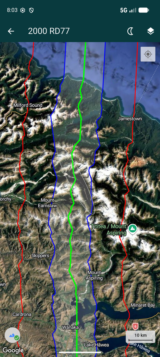 A 10 km view over New Zealand's South Island with the path lines swinging sharply off the straight prediction as they cross the Southern Alps