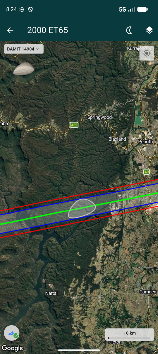 2000 ET65's flat, elongated DAMIT 14904 silhouette drawn near the shadow band over the Blue Mountains, with the badge naming the model
